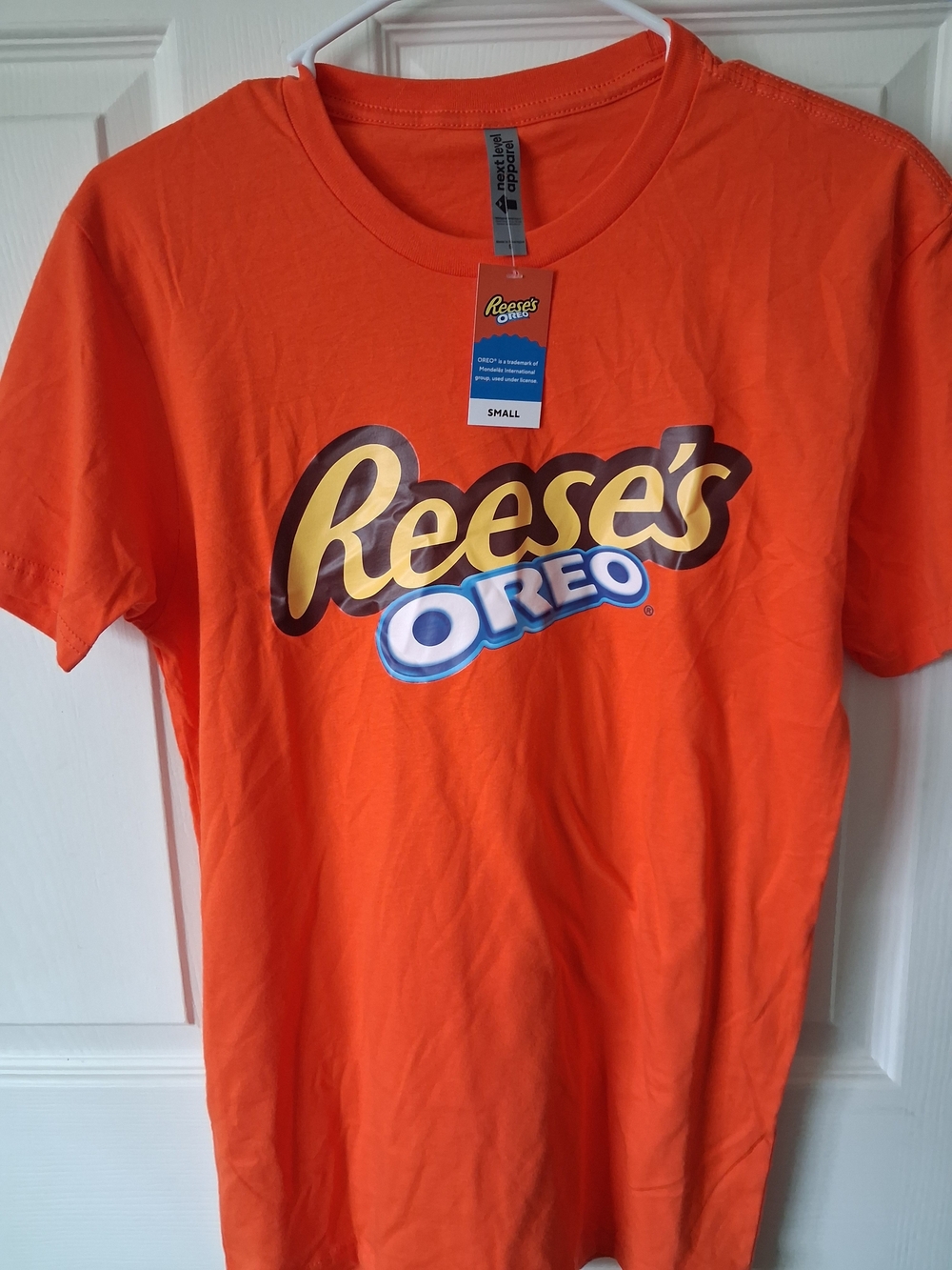 Next Level Apparel Orange Reese's Oreo Graphic Tee